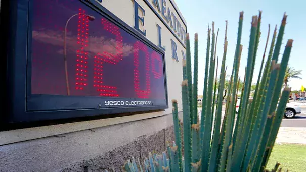 A sign, in direct sunlight, indicates 120 degrees, Monday, June 20, 2016, in Phoenix. On Sunday, the mercury climbed to 118, breaking a record of 115 set nearly 50 years ago. Photo: Matt York, AP