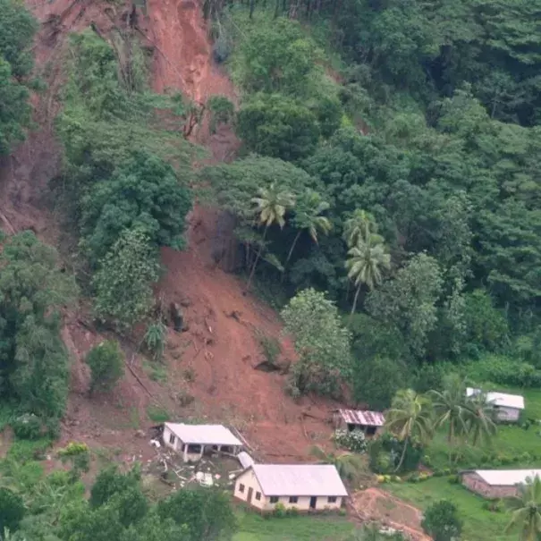 Tukuraki Village seen swamped under dirt after a landslide. Photo: Janet Lotawa