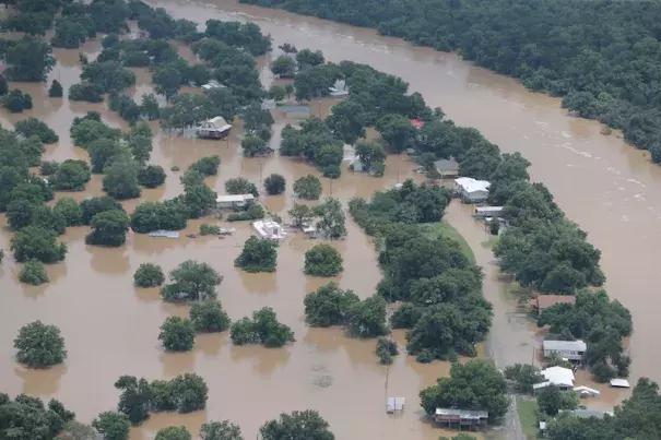 An aerial view of homes in the Horseshoe Bend area on the banks of the Brazos River in north central Texas on Wednesday, June 1, 2016. Residents of some rural southeast Texas counties braced for more flooding along the river that is expected to crest at a record level just two years after it had run dry in places because of drought. Photo: Brandon Wade, Star-Telegram via AP