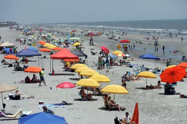 Summer always brings out the beachgoers in the Lowcountry, but a heat wave can create unforeseen dangers. Temperatures should peak Friday and Saturday at or near 100 degrees. But with dangerous heat indices predicted, the American Red Cross is urging caution. Photo: Leroy Burnell