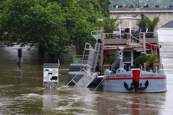 A lounge boat docked in the flooded Seine river in Paris. The rain-swollen river receded significantly on Sunday after reaching its highest level in three decades. Photo: Agence-France-Presse/ Getty Images