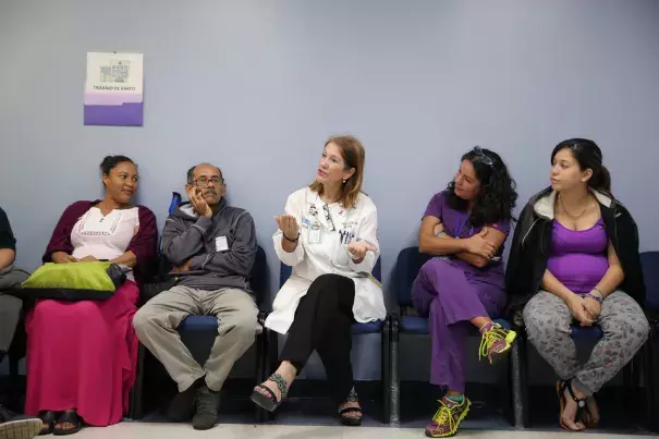 Carmen Zorrilla, an obstetrician-gynecologist for women with high-risk pregnancies, discusses how to prevent Zika at a group prenatal-care session at University Hospital in San Juan, Puerto Rico. Photo: José Jiménez