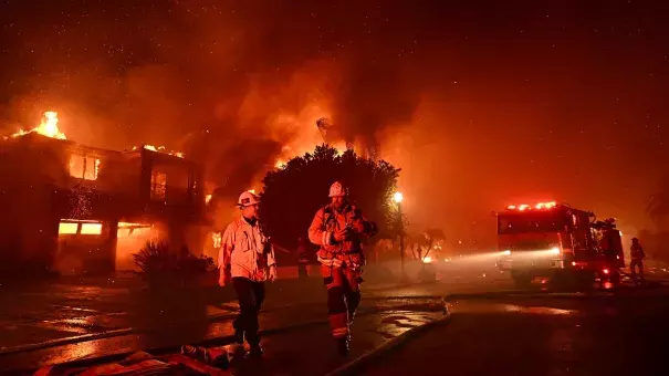 Firefighters battle the Coastal Fire in Laguna Niguel, California, in May 2022. (Credit: Wally Skalij/Los Angeles Times via Getty Images)