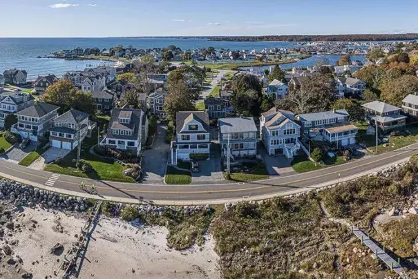 With sea levels projected to rise up to 20 inches by 2050 and 2 meters by the end of the 21st century, neighborhoods along the Connecticut shore are increasingly at risk. This image shows the Groton Long Point neighborhood. (Merged panoramic by Mark Mirko/The Hartford Courant/TNS)