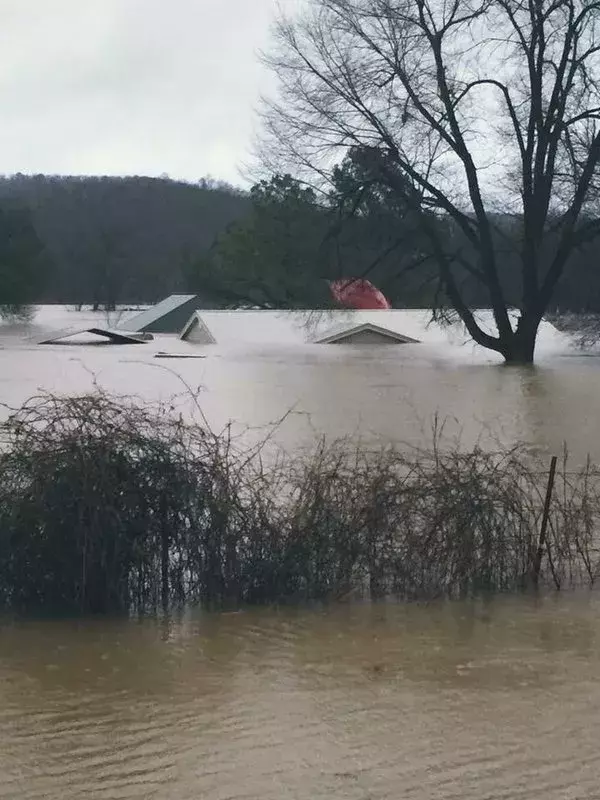 The effects of a deadly storm system that triggered tornadoes and flooding in the Midwest and Southwest could be see in Union, Mo., where homes and businesses are nearly underwater. Photo: Reuters