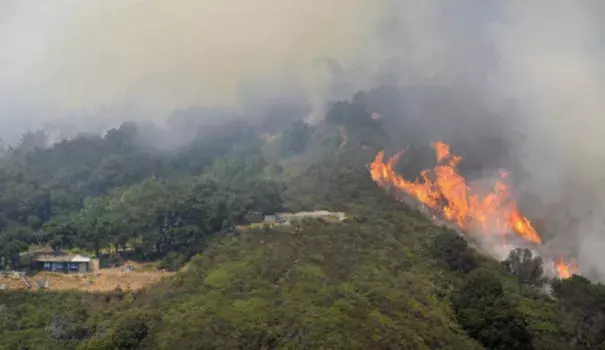 Surfer Don Curry is among those who have lost homes to the raging Soberanes fire. Photo: L.A. Times