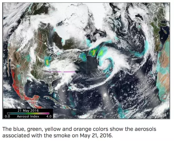 The blue, green, yellow, orange and purple colors show the aerosols associated with the smoke over eastern Canada and the western north Atlantic Ocean on May 20, 2016. Image: Weather Underground