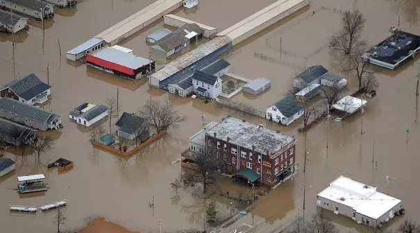 Residents and business are seen submerged in flood water from the Meremac River on December 31, 2015 in downtown Pacific, Missouri. Photo: Michael B. Thomas, Getty Images