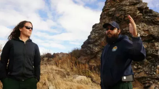 Carly Reed and Jeff Bouschor surveying the burn area.Grist | Ted Alvarez