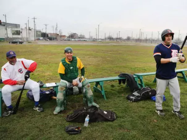 Greg Chastang, left, of Inkster and Greg Wilson, of Detroit , center, and Scott Misuraca of Warren usually participate in baseball with the Men's Senior Baseball League from April-September. They are playing a pick up game at Navin Field Sunday, Dec. 13, 2015 on Michigan Avenue in Detroit. They say this is their first time ever playing baseball in December. (Photo: Regina H.Boone, Detroit Free Press)