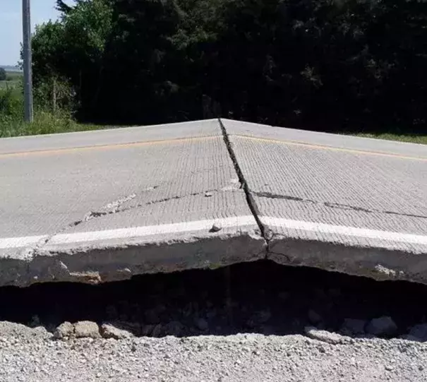 Highland Road near Atlantic, Iowa buckled in extreme heat on Saturday, when the heat index reached 101 °F. Photo: KJAN Radio, Jessica Tye Shroyer