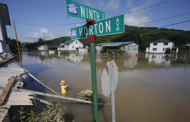 Homes immersed by flooding in Rainelle, W.Va., on June 25. Photo: Steve Helber, AP