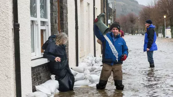 Residents of Tweed Green, Peebles Flooding on Dec. 30, 2015. IMAGE: REX FEATURES/ASSOCIATED PRESS