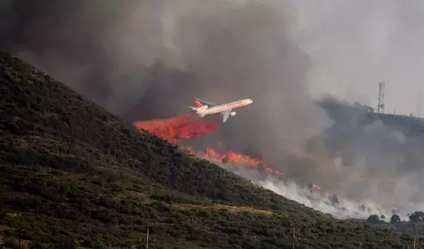 A brush fire burns in Yarnell, Ariz., on June 8, 2016. Photo: Les Stukenberg / The Daily Courier via AP