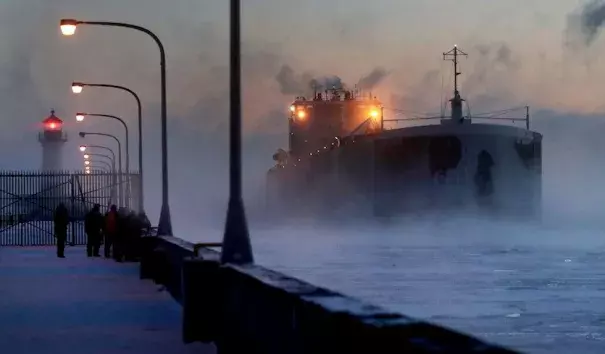 Steam rises from Lake Superior as the ship St. Clair comes to harbor on Sunday, Dec. 31, 2017, at Canal Park in Duluth, Minn. The ship arrived during the coldest holiday week (Dec. 25-31) ever recorded in Duluth. The average temperature for the seven-day period, including both highs and lows, was a bone-chilling –12.1°F. Photo: David Joles, Star Tribune via AP