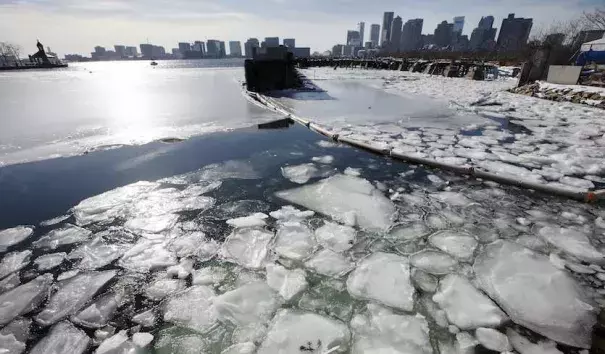 ea ice floats in Boston Harbor on Wednesday, Jan. 3, 2018. The ice could exacerbate the impacts of Thursday’s intense coastal storm. Photo: Michael Dwyer, AP