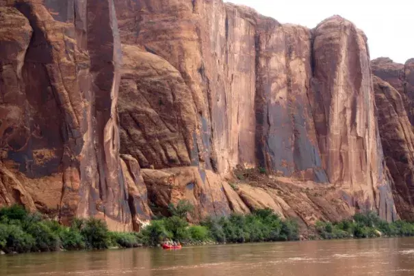 Rafters float down the Colorado River near Moab, Utah, July 25, 2017. Scant snow in the mountains that feed the Colorado River means the river will probably send less than half the normal amount of runoff into Lake Powell this spring. Credit: Dan Elliot, AP