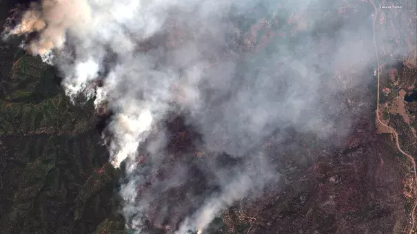 A satellite image provided by DigitalGlobe shows the 416 Fire northwest of Hermosa, Colo., which has forced the closure of the San Juan National Forest. Credit: AP