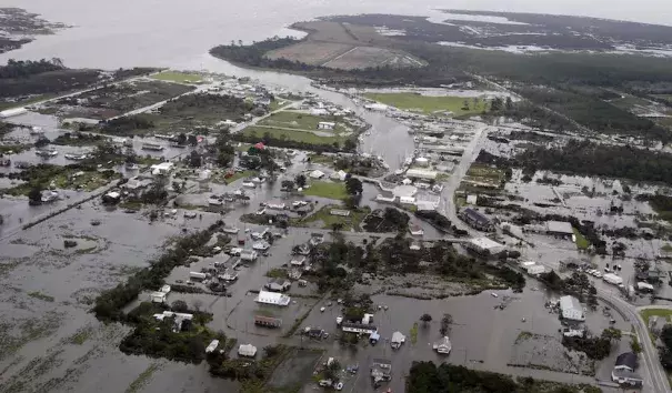 Flooding and storm surge related to Hurricane Florence inundate the town of Engelhard, N.C., on Saturday, Sept. 15, 2018. Engelhard is one of many communities on the west side of Pamlico Sound affected by some of the largest storm surge associated with Florence's slow-motion approach. Credit: AP Photo, Steve Helber