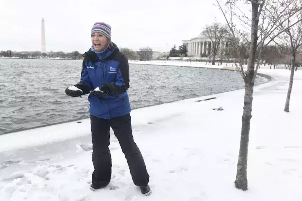The Weather Channel's Jen Carfagno reports on Winter Storm Stella from the Tidal Basin in Washington, D.C. on Tuesday, March 14, 2017. Photo Kevin Wolf, AP Images for The Weather Channel