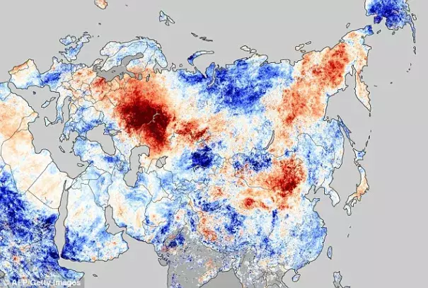 A Nasa image shows hotspots (in red) in the vast country caused by out-of-control wildfires. There are at least 550 separate blazes nationwide