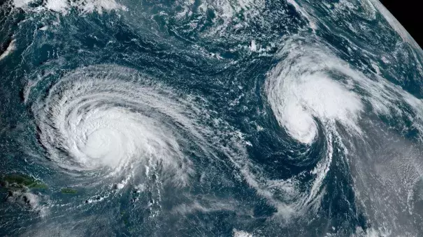 On the morning of September 11, 2023, Hurricane Lee (left) churned in the Atlantic Ocean northeast of Puerto Rico, with Tropical Storm Margot (right) further to the east. (Credit: NOAA via Popular Science)