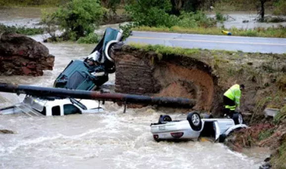 Bridge washout and its results at Highway 287 and Dillon Rd. in Lafayette just east of Boulder. Photo: Cliff Grassmick, Boulder County News