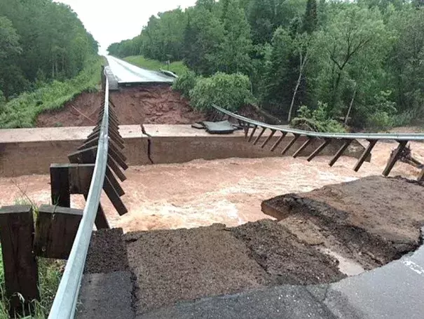 Flash flooding washed out U.S. Highway 2 at North Fish Creek, about 10 miles west of Ashland, Wis., on Sunday. Credit: Wisconsin Department of Transportation