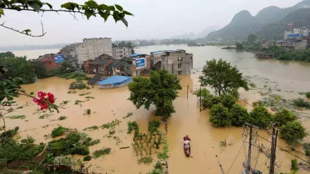 Aerial view of the flooded houses at Rongshui Miao Autonomous County on July 3, 2016 in Liuzhou, Guangxi Province of China. Photo: Long Tao/VCG via Getty Images