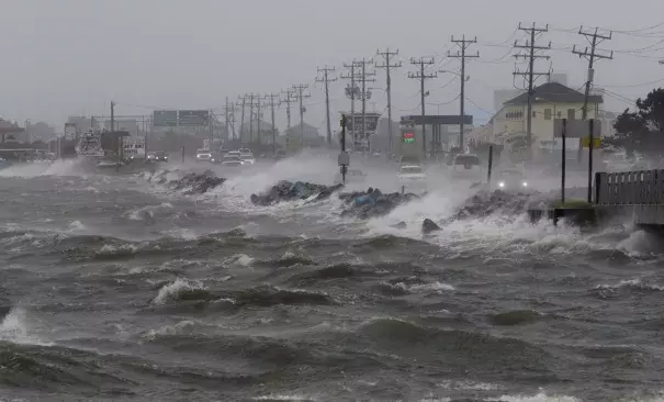 Water from Roanoke Sound pounds the Virginia Dare Trail in Manteo, N.C., Saturday, Sept. 3, 2016 as Tropical Storm Hermine passes the Outer Banks. Hermine lost hurricane strength over land but was intensifying Saturday along the Atlantic Coast, threatening heavy rain, wind and storm surges on its northward march. Photo: Tom Copeland, AP