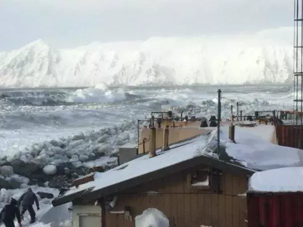 Waves batter Little Diomede Island, where the coastal community is normally protected by ice through the winter. This year was different. Photo: Frances Ozenna