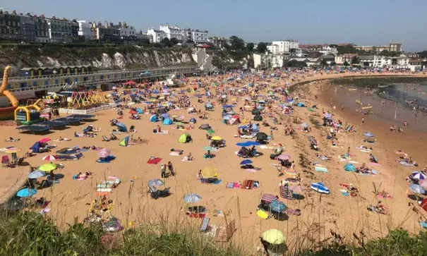 People flock to Broadstairs beach in Kent, England, on July 25. Photo: Wesley Johnson, AP