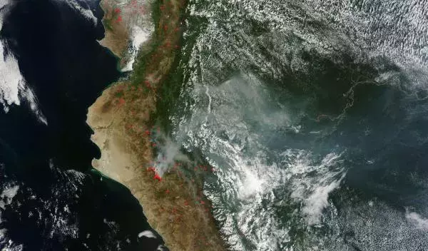 Last November, wildfires burned through the Amazon rainforest in Peru as  a record drought left the region bone-dry. From Drought Now Spans the Globe. Image: LANCE-MODIS