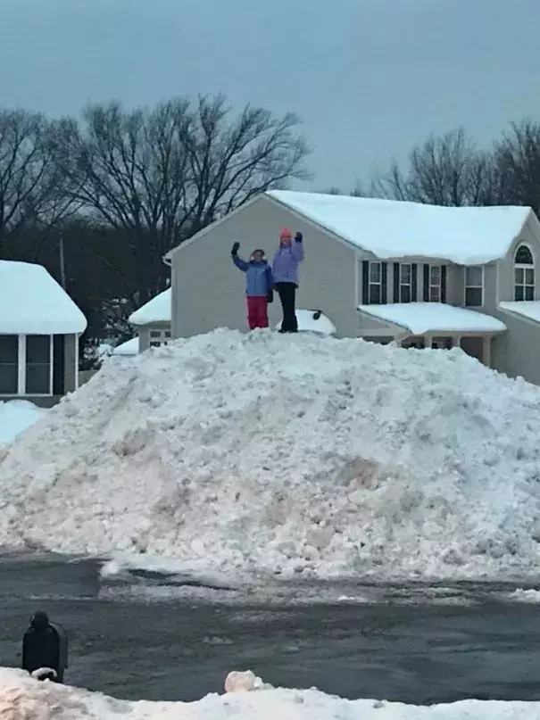 Epic snow pile the result of a 2 week deep freeze with days of heavy snowfall in the Syracuse NY area.This view is from my home's front window Monday. Photo: Mike Brookins via Twitter