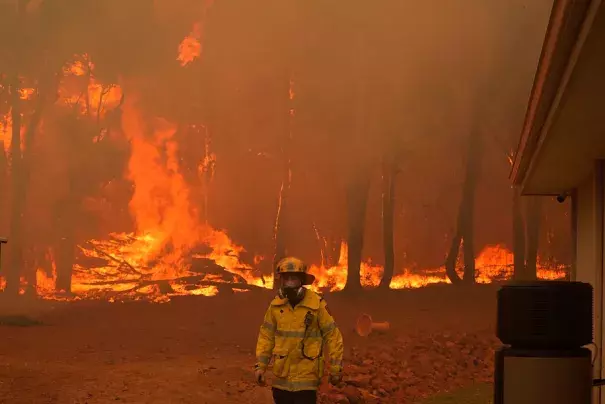 A firefighter at a blaze near Wooroloo, northeast of Perth, Australia, on Feb. 2, 2021. (Evan Collis/AP)