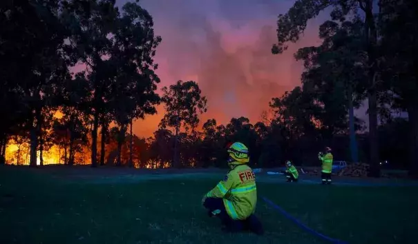 Fire crews in Colo Heights, Australia as bushfires spread. Credit: Brett Hemmings/Getty Images.