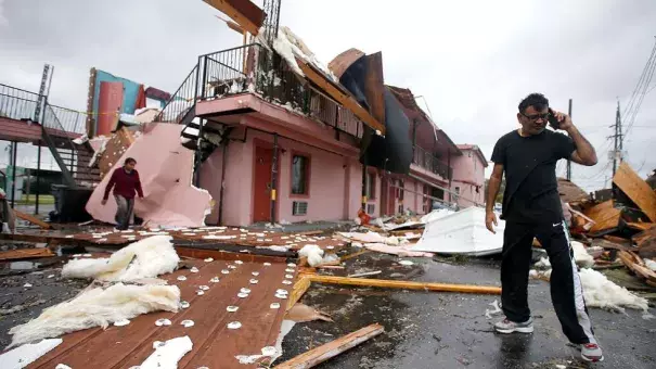 A man walks through the debris of what once was a motel on Chef Menture Ave. after a tornado touched down on February 7, 2017 in New Orleans East, Louisiana. According to the NWS, 25 people were injured in the aftermath of the tornado. Photo: Sean Gardner, Getty Images