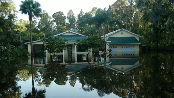 Floodwaters from the Alafia River flood homes in a neighborhood in the wake of Hurricane Irma on September 12, 2017 in Valrico, Florida. Photo: Brian Blanco, Getty Images