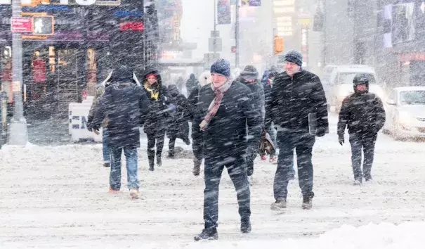 Pedestrians navigate Times Square in New York City, during a snowstorm on Jan. 4, 2018. Photo: Michael Brochstein/SOPA Images/LightRocket via Getty Images