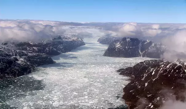 A fjord in southern Greenland, as seen during NASA's Operation IceBridge's last flight of the 2017 Arctic campaign, on May 12, 2017. IceBridge has operated over the last few year to supplement observations of Arctic sea ice ahead of the upcoming Ice, Cloud, and land Elevation Satellite-2 (ICESat-2), due to launch in 2018. Photo: John Sonntag, NASA