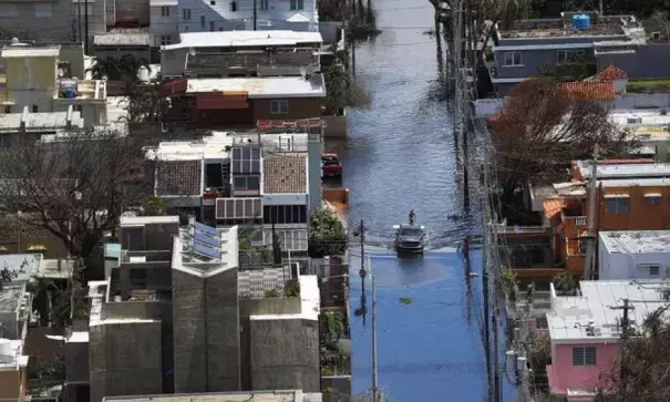 A flooded street in San Juan, Puerto Rico after Hurricane Maria. Photo: Joe Raedle | Getty Images