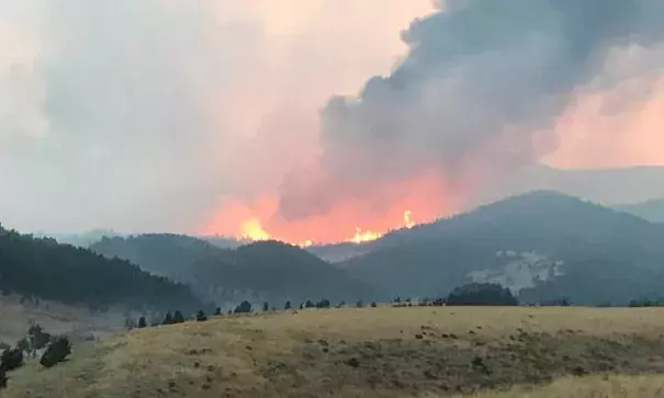 Fires blaze from the Blacktail Fire, located in the Blacktail Creek area, east of Loco Mountain in the Crazy Mountains, in Montana. The Blacktail Fire engulfed a little over 5,000 acres, with over 1 million acres impacted across Montana through various wildfires.