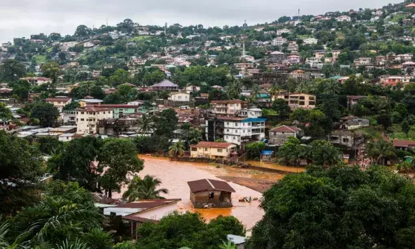 A house in Freetown was surrounded by water. Some homes were submerged, and many buildings were flattened altogether. Photo: Jane Hahn, New York Times