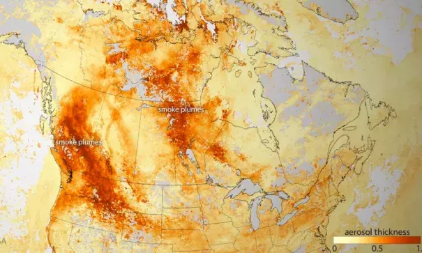 Wildfires produce high concentration of aerosols, smoke, and haze (dark orange). Photo: NOAA