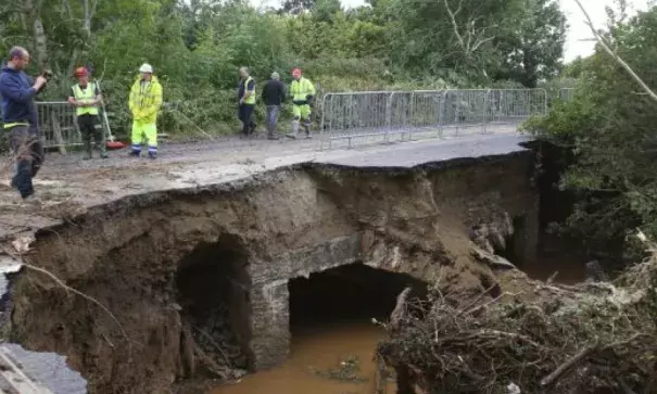 A collapsed road at Quigley’s Point in Co Donegal after heavy rain left a trail of destruction. Photo: Niall Carson/PA Wire