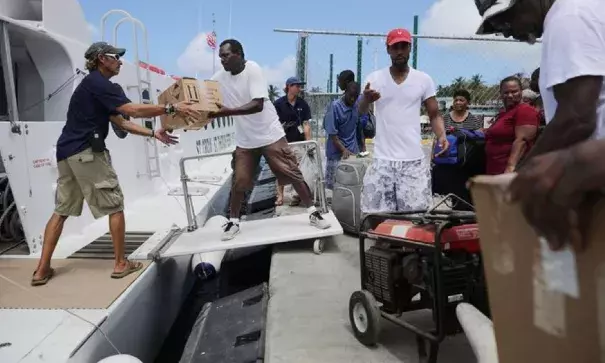 Supplies for those affected by Hurricane Irma in St. Thomas were loaded onto a boat in Christiansted, St. Croix, on Sunday. Photo: Chip Somodevilla, Getty Images