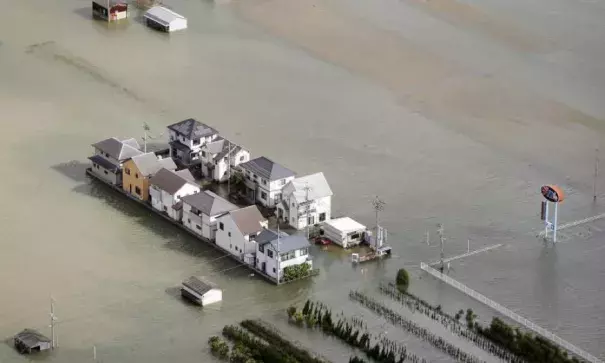 Houses are flooded in Kinokawa, Wakayama Prefecture, on Monday. Photo: KYODO