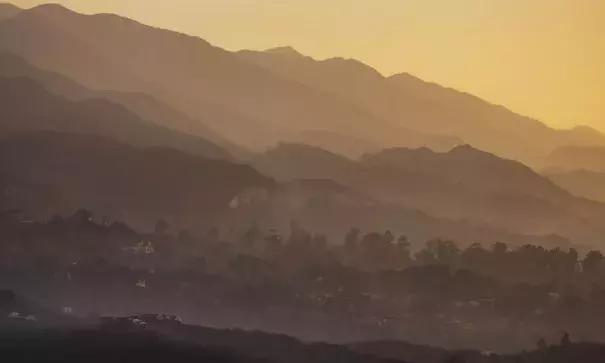 The sun rises as fire crews prepare for another day of fighting the Thomas fire in Montecito on Sunday. Photo: Marcus Yam, Los Angeles Times