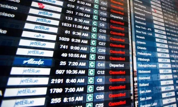 The information board in Terminal C at Logan International Airport shows the majority of flights canceled during Winter Storm Stella in Boston, on March 14, 2017. Photo: Scott Eisen, Getty Images