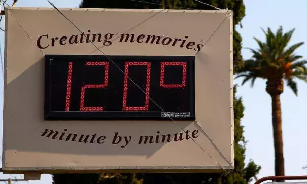 A local temperature sign reads 120 degrees as temperatures climb to near-record highs Tuesday, June 20, 2017, in Phoenix. Photo: Ross D. Franklin